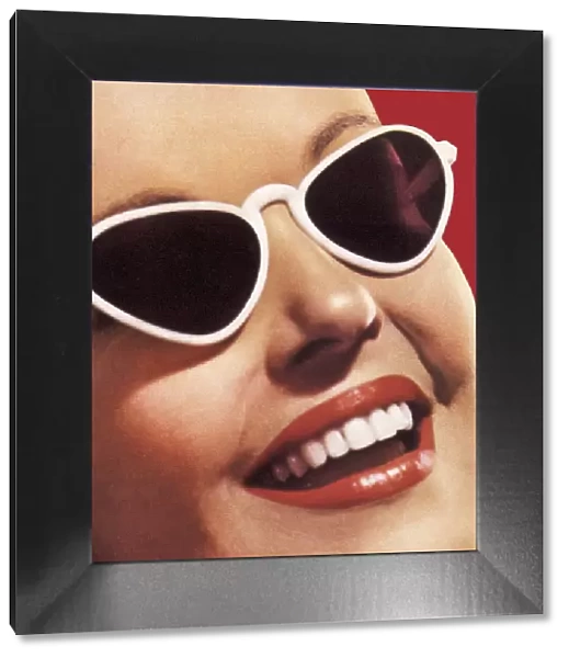 Closeup of Smiling Face with Sunglasses