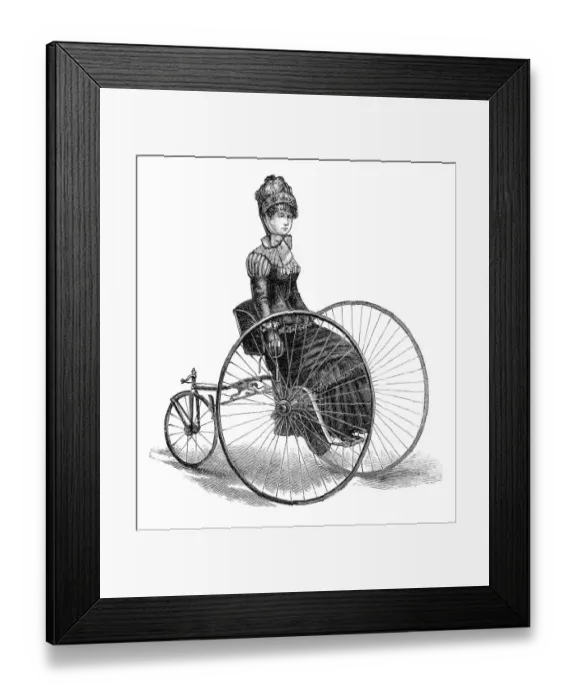 Framed Print : Woman riding Penny Farthing bike 1885 illustration Framed Print : Woman riding Penny Farthing bike 1885 illustration