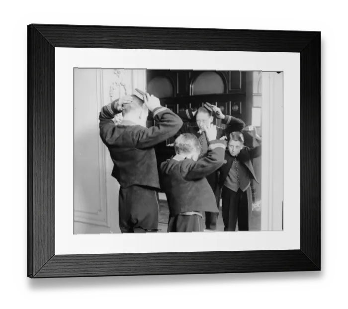 Framed Print : Page Boys. Page boys at Hotel Cecil prepare for an inspection
