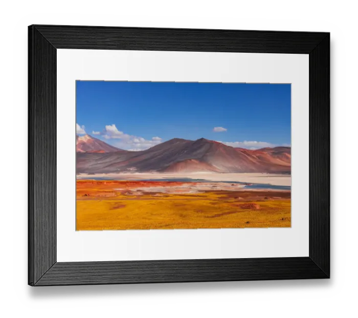 Framed Print : Yellow volcanic scenery with colorful mountains and a blue salt lake Framed Print : Yellow volcanic scenery with colorful mountains and a blue salt lake