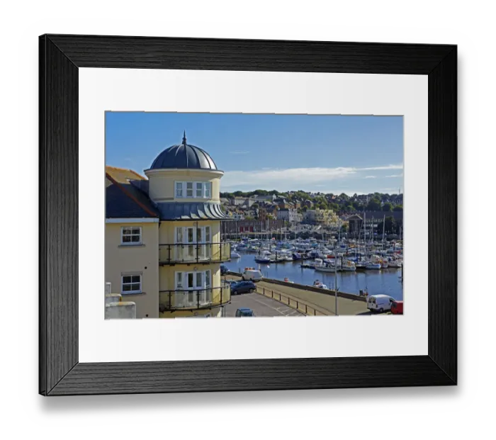 Framed Print : View over Weymouth harbour with blue skies
