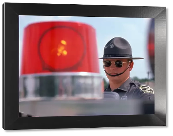 Policeman and radar control. (Photo by H. Armstrong Roberts  /  Retrofile  /  Getty Images)