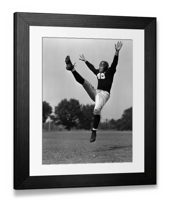 Framed Print : American football player at kick-off