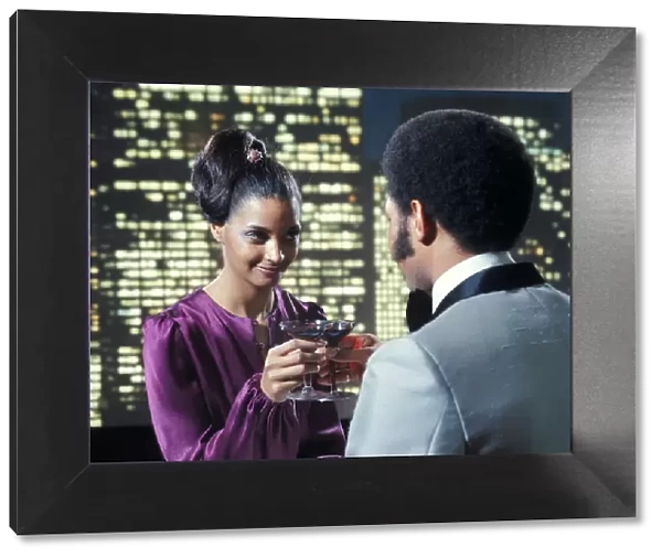 African-American Couple Man Woman Toasting Wine Glasses Romance Night Skyline Dress