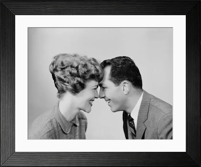 Framed Print : Couple, head to head, smiling and looking into each others eyes Framed Print : Couple, head to head, smiling and looking into each others eyes