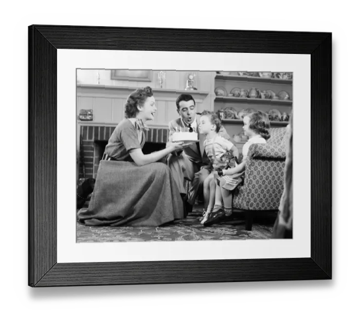 Framed Print : Family celebrating sons birthday