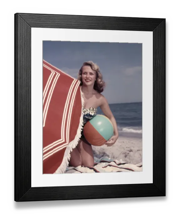 Framed Print : Smiling Blonde Woman Bathing Suit Hold Beach Ball Kneel In Sand By Red Sun Umbrella Framed Print : Smiling Blonde Woman Bathing Suit Hold Beach Ball Kneel In Sand By Red Sun Umbrella