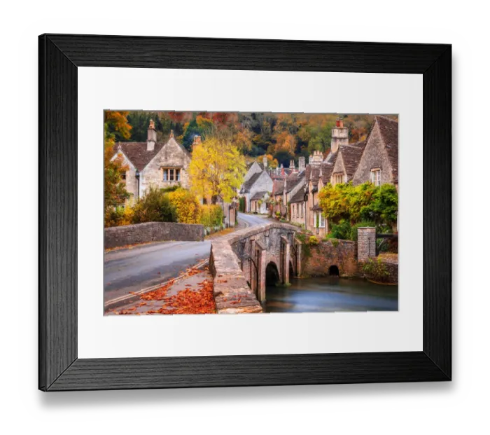Framed Print : Castle Combe in Wiltshire, England in the Autumn Framed Print : Castle Combe in Wiltshire, England in the Autumn