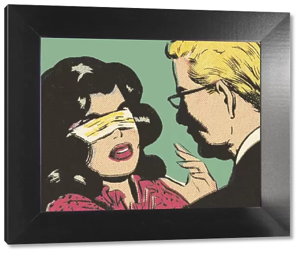 Man and Blindfolded Woman