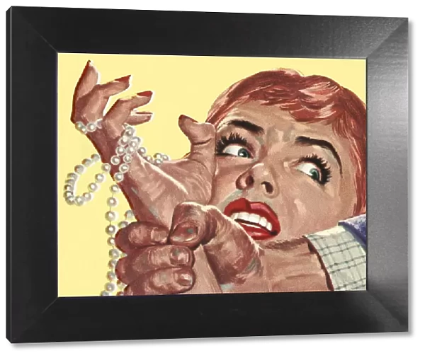 Frightened Woman Holding Pearls