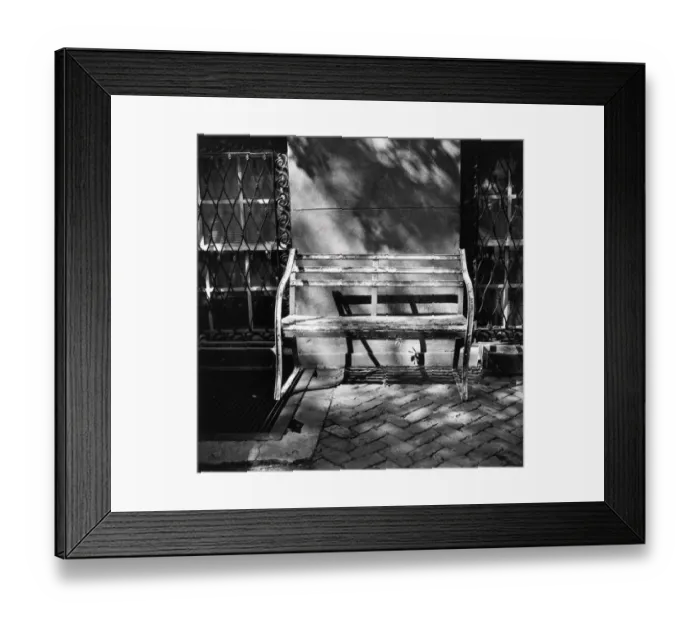 Framed Print : Bench with peeling paint against building wall Framed Print : Bench with peeling paint against building wall