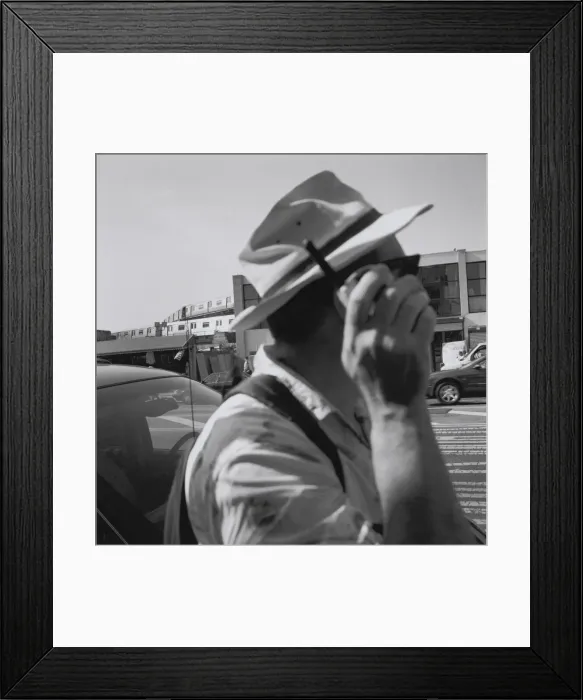 Framed Print : Man with cell phone