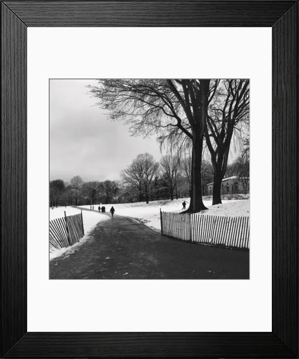 Framed Print : People walking on a path through a snow covered park Framed Print : People walking on a path through a snow covered park