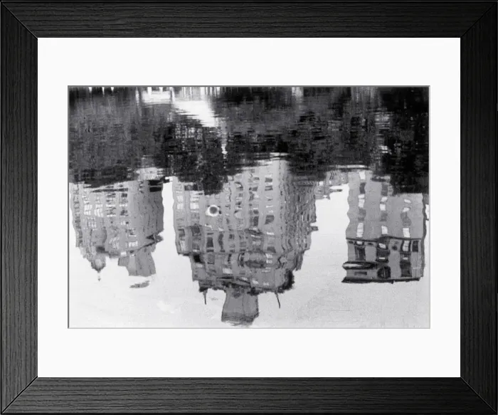 Framed Print : Buildings reflected in pool of water Framed Print : Buildings reflected in pool of water