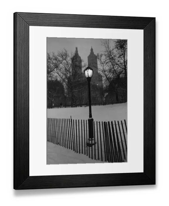 Framed Print : Small wooden fence and a lamppost in a snowy park Framed Print : Small wooden fence and a lamppost in a snowy park