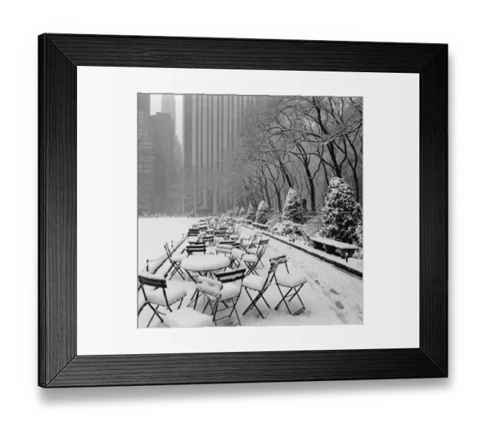 Framed Print : Tables and chairs in park covered with snow, New York City Framed Print : Tables and chairs in park covered with snow, New York City