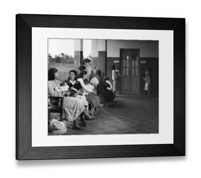 Framed Print : Clinic. circa 1930: Mothers in Paraguay wait with their children for a Framed Print : Clinic. circa 1930: Mothers in Paraguay wait with their children for a