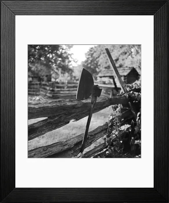 Framed Print : Broad Axe. circa 1956: A broad axe rests on a split-rail fence in the village of New Salem Framed Print : Broad Axe. circa 1956: A broad axe rests on a split-rail fence in the village of New Salem