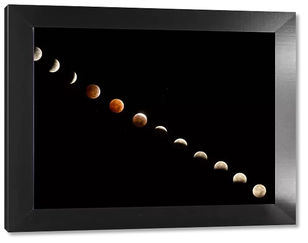 Composite of Total Lunar Eclipse in a dark sky