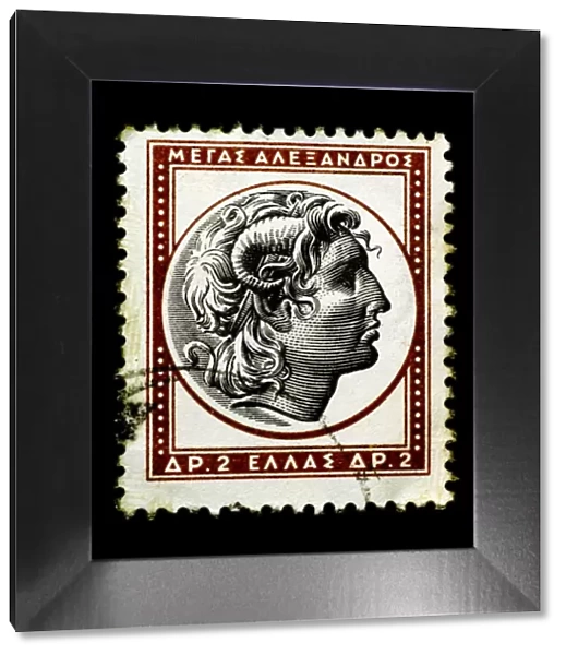Alexander the Great on Greek stamp isolated in black