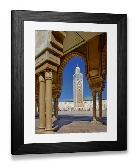 Framed Print : Mosque of Hassan II and minaret through the arches of the square outside it in Casablanca Framed Print : Mosque of Hassan II and minaret through the arches of the square outside it in Casablanca