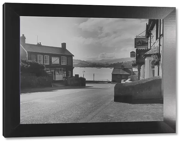 Deganwy. circa 1955: A street and pub in Deganwy a small town on the Conway estuary