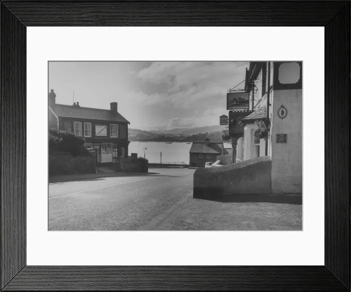 Framed Print : Deganwy. circa 1955: A street and pub in Deganwy a small town on the Conway estuary Framed Print : Deganwy. circa 1955: A street and pub in Deganwy a small town on the Conway estuary