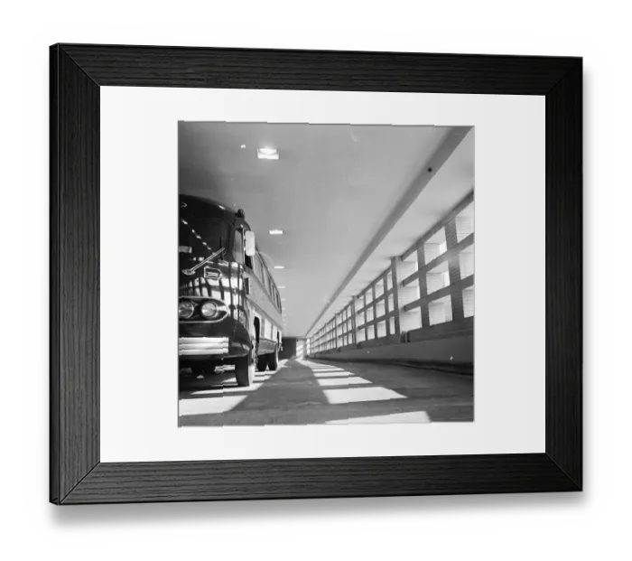 Framed Print : Bus Dock. circa 1955: A bus in the bus docks at New Yorks East Side Airlines Terminal Framed Print : Bus Dock. circa 1955: A bus in the bus docks at New Yorks East Side Airlines Terminal