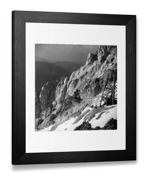 Framed Print : Zugspitze. 1957: A cable car ascending to the top of Zugspitze in the Austrian Tyrol