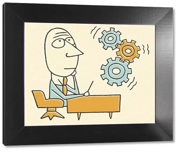 Gears Turning and Businessman Sitting at a Desk