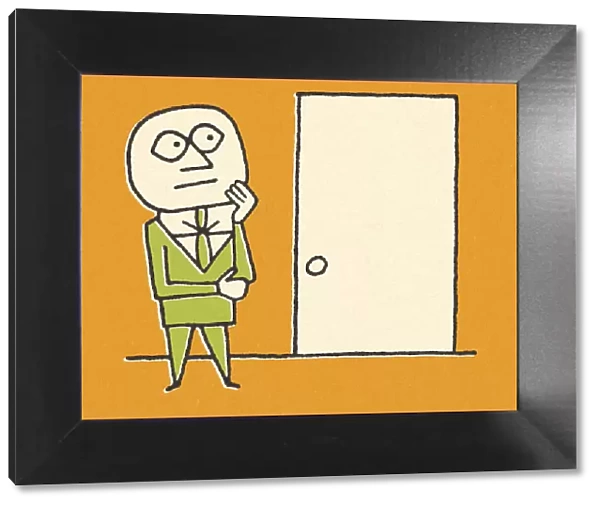 Businessman Standing In Front of a Door