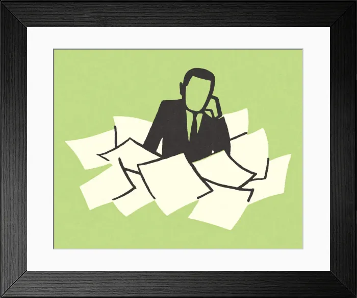 Framed Print : Man Surrounded with Paperwork Framed Print : Man Surrounded with Paperwork
