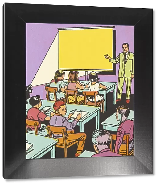 Teacher Showing a Film in a Classroom