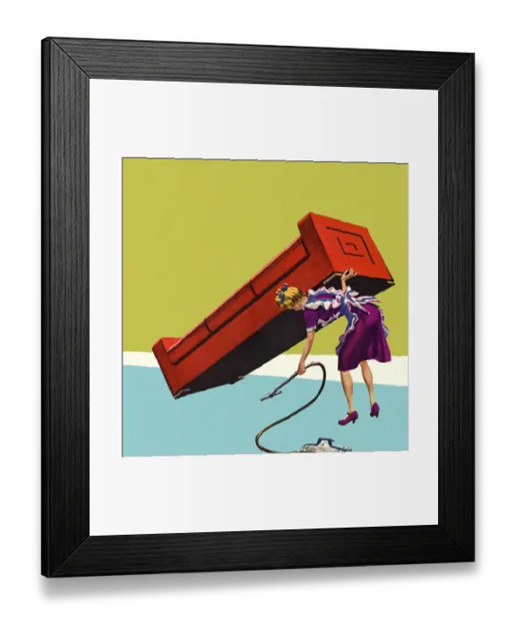 Framed Print : Woman Vacuuming Under a Sofa Framed Print : Woman Vacuuming Under a Sofa
