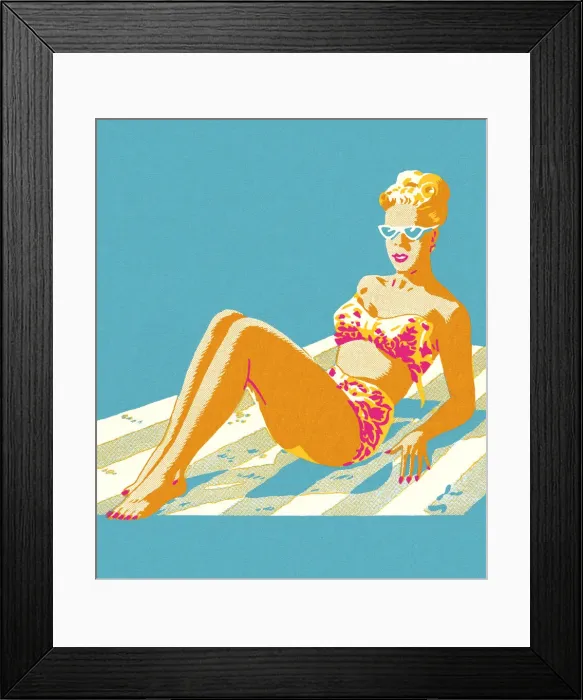 Framed Print : Woman in a Bikini Sitting on a Blanket Framed Print : Woman in a Bikini Sitting on a Blanket