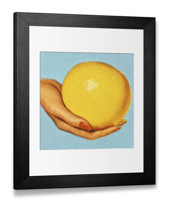 Framed Print : Womans Hand Holding a Grapefruit