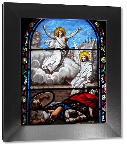 Biblical scene of the resurrected Jesus Christ on an antique stained glass window
