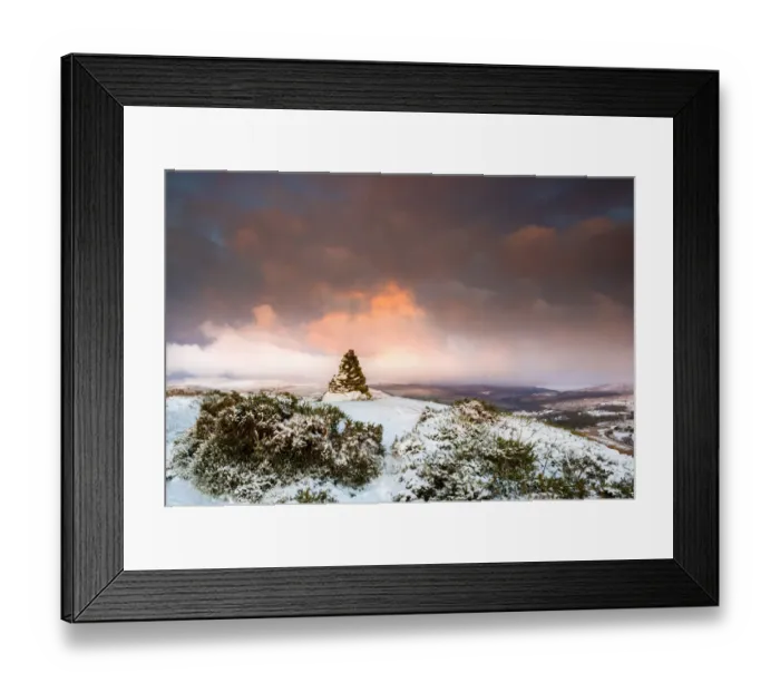 Framed Print : Cairn on snow covered hill fort at Cwmyoy near Abergavenny in the Black Mountains