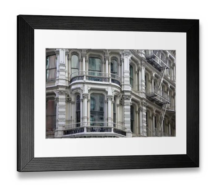 Framed Print : Bay window of typical cast iron building with fire escapes in Chelsea, New York City Framed Print : Bay window of typical cast iron building with fire escapes in Chelsea, New York City