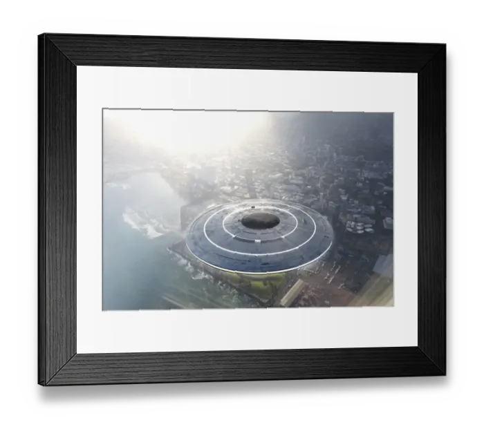 Framed Print : Circular UFO flying over city