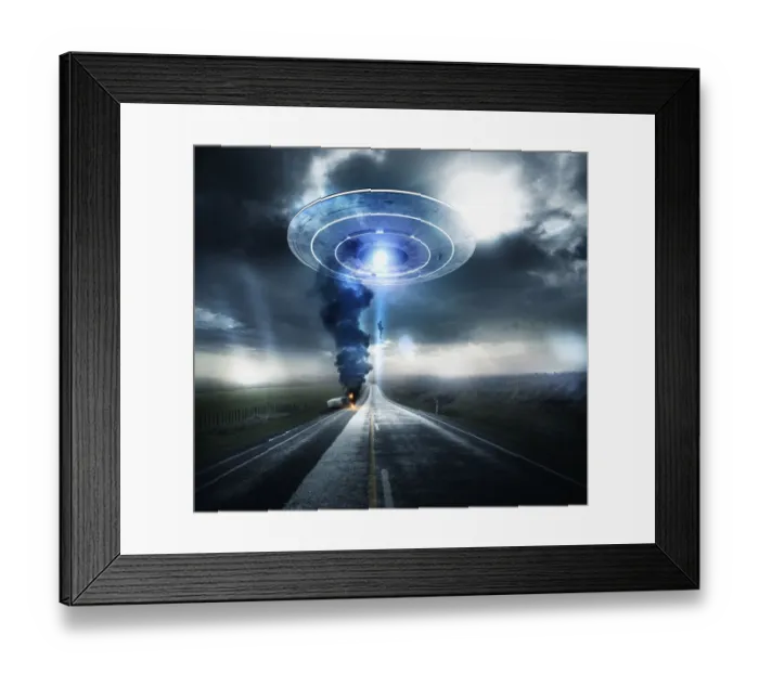 Framed Print : Caucasian man beaming up to UFO over highway Framed Print : Caucasian man beaming up to UFO over highway