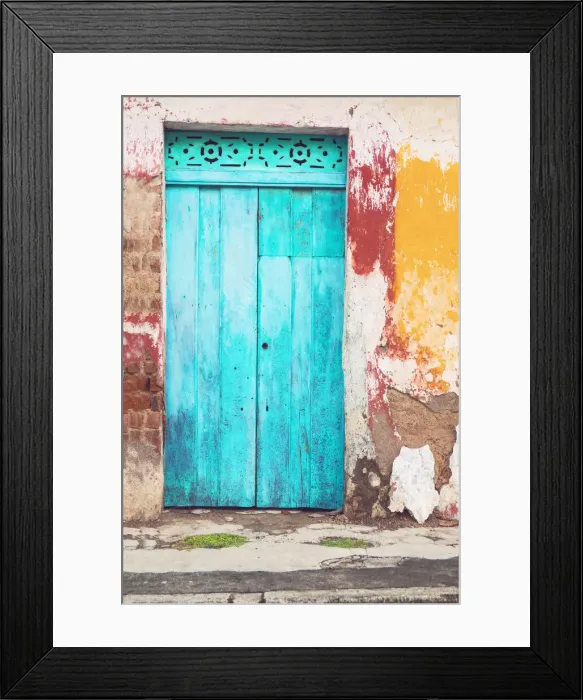 Framed Print : Old and beautiful turquoise door and old multicorored facade at house Framed Print : Old and beautiful turquoise door and old multicorored facade at house