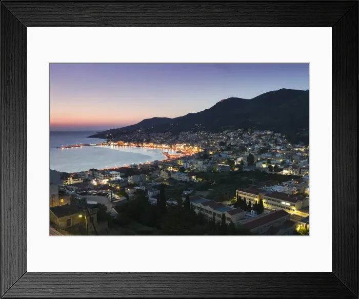 Framed Print : Greece, Samos, Vathy, harbour illuminated at dusk, elevated view Framed Print : Greece, Samos, Vathy, harbour illuminated at dusk, elevated view