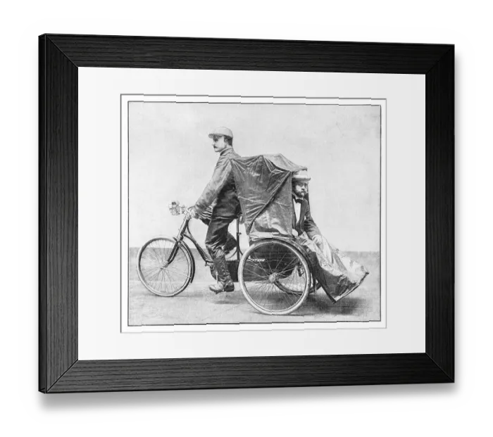 Framed Print : Man driving tricycle or pedicab in Berlin for public transportation in Berlin Germany Framed Print : Man driving tricycle or pedicab in Berlin for public transportation in Berlin Germany