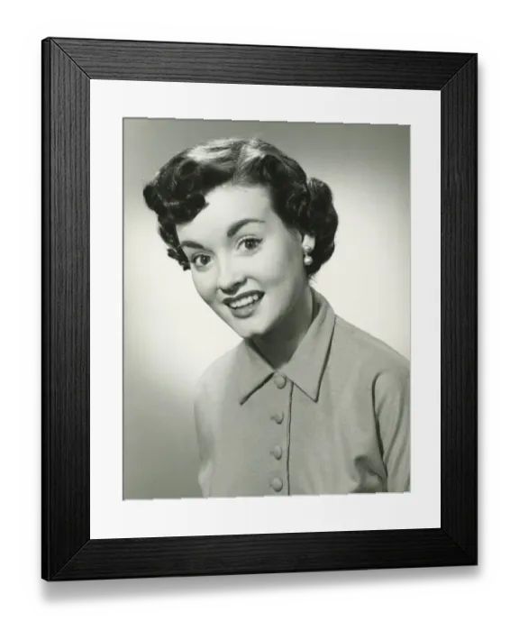 Framed Print : Young woman with short hair smiling, (B&W), portrait Framed Print : Young woman with short hair smiling, (B&W), portrait