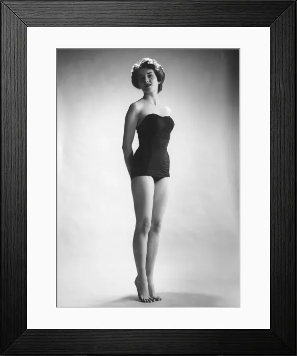 Framed Print : Woman in black corset posing in studio (B&W)
