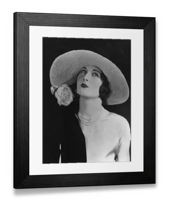 Framed Print : Large Hat. A woman wearing a wide brimmed hat with a rose Framed Print : Large Hat. A woman wearing a wide brimmed hat with a rose
