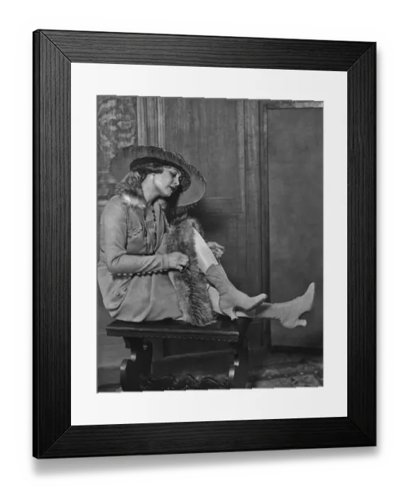 Framed Print : New Boots. Model Gazelle Marche wearing a pair of high lace Framed Print : New Boots. Model Gazelle Marche wearing a pair of high lace