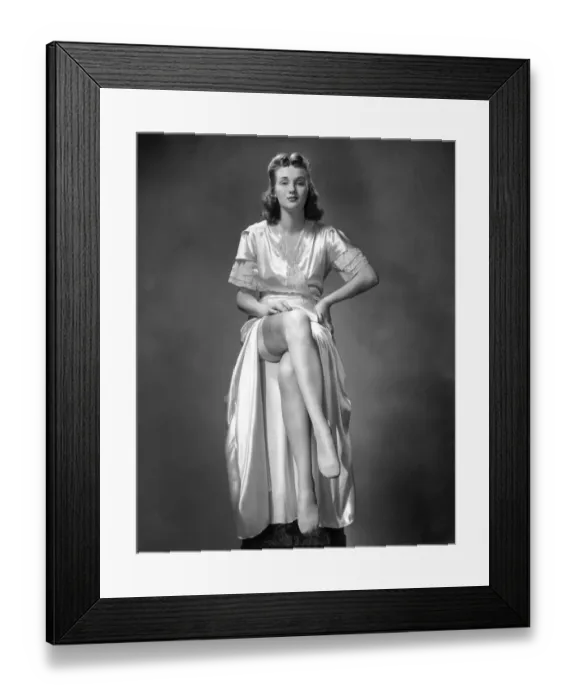 Framed Print : Woman in derssing gown and silk stockings Framed Print : Woman in derssing gown and silk stockings