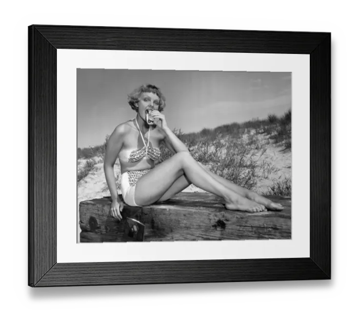 Framed Print : Woman in bikini, eating a hotdog Framed Print : Woman in bikini, eating a hotdog